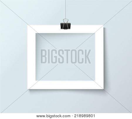 Paper frame with paper clips isolated on grey background. Realistic vector illustrationDesign template for your photography, text and picture.