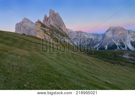 Gardena valley wonderful Seceda peak the Odle mountain range in the Dolomites at sunset in Italy