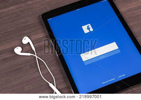 Sankt-Petersburg Russia December 20 2017: Apple iPad Pro with Facebook homepage on monitor screen. Facebook one of the biggest social network website. Homepage of Facebook.com on tablet computer.