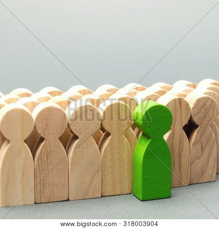 Green Man Coming Out Of The Crowd. The Chosen Person Among Others. A Talented Worker. Promotion. Con