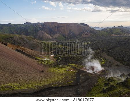 Colorful Rhyolit Mountain Panorma With Multicolored Volcanos And Geothermal Fumarole And In Landmann