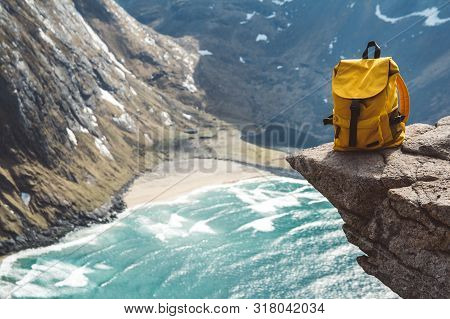 Hiker Tourist Yellow Backpack On Rock In Mountain, Panoramic Landscape, Traveler Relax Holiday Conce