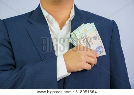 Money In Vietnam Hold On Hand Business Man Wearing A Blue Suit (socialist Republic Of Vietnam), Dong