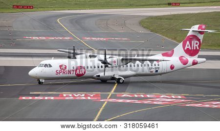 Airplane Taxi In Dusseldorf Airport