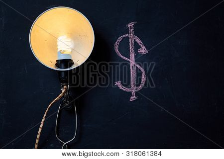 Business Idea, Individuality And Creativity. Success And Motivation. Vintage Light Bulb And Dollar S