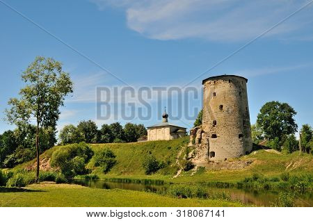 View Of The Gremyachaya Tower (part Of The Medieval Pskov Fortress) Over The Pskova River, Pskov, Ru