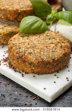 Tasty Vegetarian Burgers Made From Healthy Quinoa, Basil, Tomatoes And Mozzarella Cheese