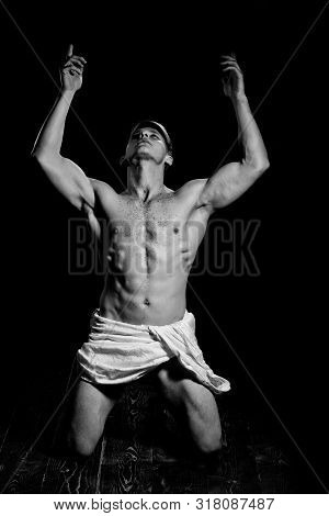 Adam With Glitter On Bare Chest. Man With Muscular Wet Body In White Fascia. Sport And Workout. Athl
