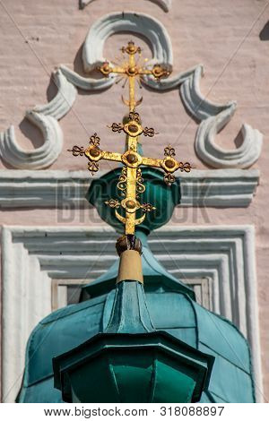 Exterior View Of The Church Of The Holy Cross In Warsaw, With People.