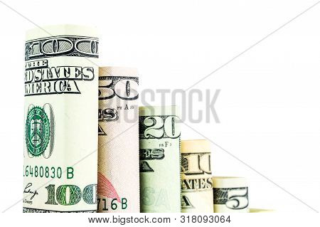 Declining Steps Made Of Blocks Of All American Dollar Denomination Banknotes In One Row On White Bac