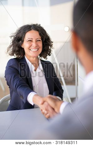 Happy Successful Business Colleagues Meeting Outside And Closing Deal. Joyful Business Woman And Man