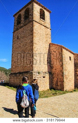 Riopar Viejo, Albacete, Spain- February 8, 2019: Tourists Visiting And Walking Through Cobbled Stone