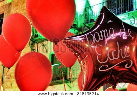 Elche, Spain- August 13, 2018: Elche Town Hall Square Decorated With Colorful Bulbs And Garlands For