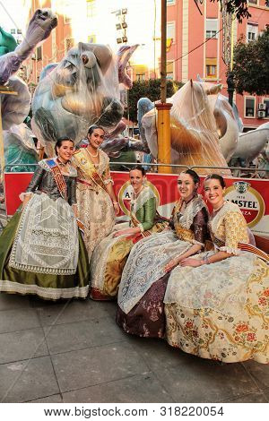 Valencia, Spain- March 12, 2018: Women Falleras Majors Of Valencia Chatting, Dressed In The Typical 