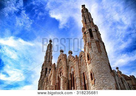 Novelda, Alicante, Spain- November 28, 2018: Details, Archs, Tower And Tiles Of Sanctuary Of Santa M
