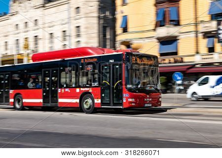 Stockholm, Sweden - April 18, 2019: Red Man Lions City Cng Bus As A Mean Of Public Transport In Scan
