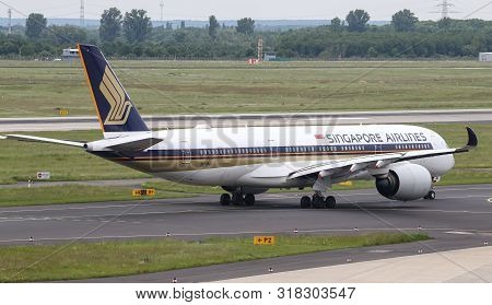 Airplane Taxi In Dusseldorf Airport