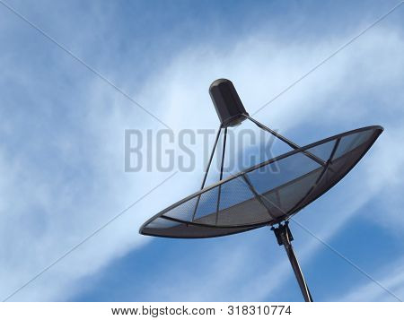 Sattlelite technology connect people from around the world. Sattlelite dish with blue sky background