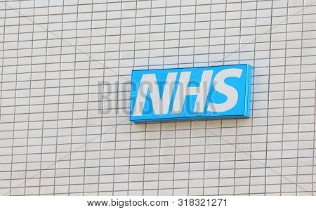 London England - June 2, 2019: Nhs National Health Service Sign Uk
