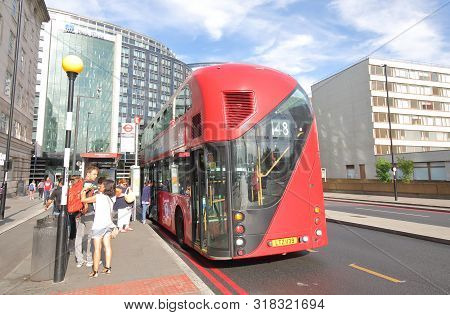 London England - June 2, 2019: Unidentified People Travel By Double Decker Bus In Downtown London Uk