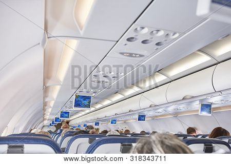 Airplane Interior With Seats And Display With Gps. Comercial Flight