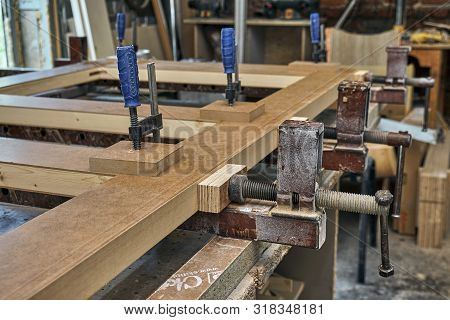 Joinery. Wood Door Manufacturing Process. Clamping And Gluing Door Leaf. Furniture Manufacture.