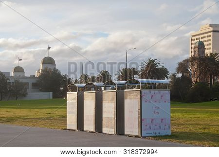 Melbourne, Australia - July 29, 2018: Four Stacks Of Melbourne City Councils Metal Bins Locates Near