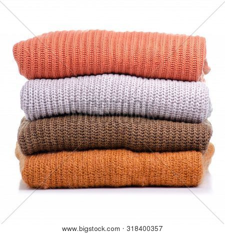 Stack Folded Sweater Clothing On White Background Isolation