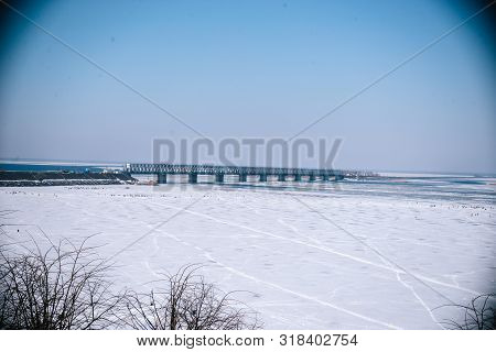 Bridge Over The Frozen River In Cherkassy.