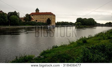 Podebrady Castle View From The Opposite Bank During Falling Rain