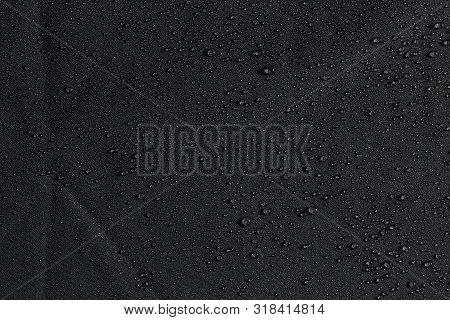 Dark Gray Waterproof Hydrophobic Flat Cloth Closeup With Rain Drops Background