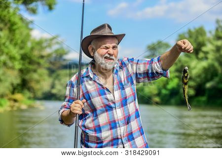 Carry On Fishing. Summer Weekend. Big Game Fishing. Fisherman With Fishing Rod. Hobby And Sport Acti