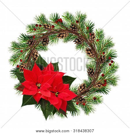 Round Wreath From Dry Twigs And Christmas Tree Branches With Red Berries, Cones, And Poinsettia Flow