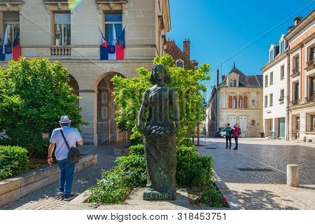 ORLEANS, FRANCE - May 8, 2018: statue Joan of Arc is an 1874 French gilded bronze equestrian sculpture of Orleans Cathedral in Orleans, France