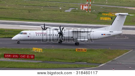 Airplane Taxi In Dusseldorf Airport