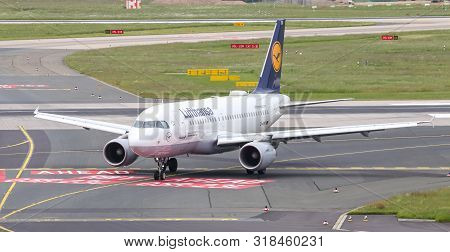 Airplane Taxi In Dusseldorf Airport