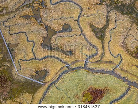 Aerial Top Down View Of Tidal Marshland With Natural Meandering Drainage System In Verdronken Land V