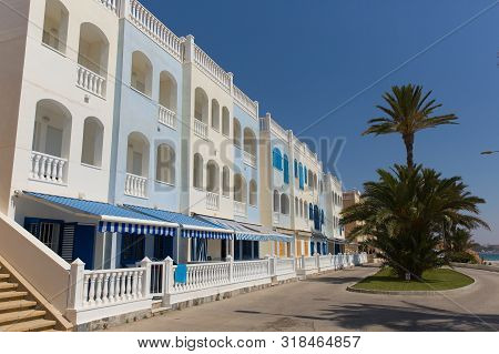 Mil Palmeras Costa Blanca Spain With Seafront Apartments In Beautiful Summer Sunshine