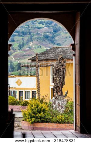 Turmeque, Colombia - August, 2019: Statue Of The Virgin Mary And Jesus In Front Of The Chapel Our La