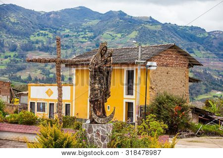 Turmeque, Colombia - August, 2019: Statue Of The Virgin Mary And Jesus In Front Of The Chapel Our La