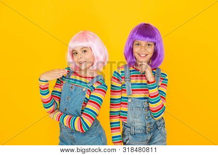 Anime Cosplay Party Concept. Happy Little Girls. Anime Fan. Cheerful Friends In Colorful Wigs. Anime