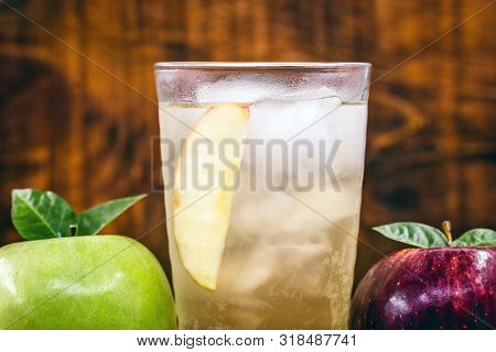 Apple Spritzer (apfelschorle) Pitcher, Glass Pitcher Of Homemade Spritzer Served With Crushed Ice An