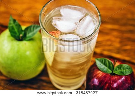 Apple Spritzer (apfelschorle) Pitcher, Glass Pitcher Of Homemade Spritzer Served With Crushed Ice An