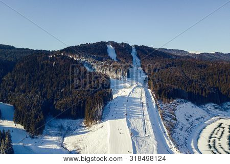 Aerial View Of A Skii Resort In The Carpathian Mountains On A Sunny Day