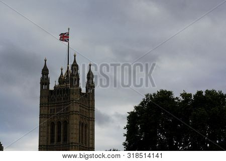 Top Portion Of A Tower Of The Houses Of Parliament In The City Of London, England