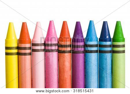 Multicoloured Crayons In A Row And Upright Position Isolated On White