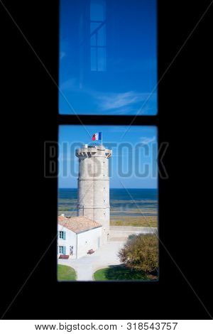 Ile de Re - the old museum tower next to the lighthouse at the northcoast taken from the window from the lighthouse
