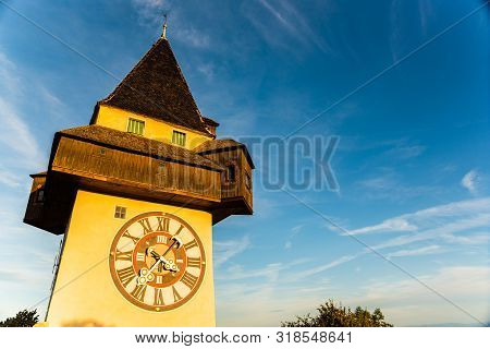 View At Famous Clock Tower Uhrturm At Schlossberg Hill. Travel Destination. Copy Space