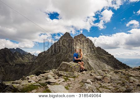 Tourists Below Rysy Tatra Mountains
