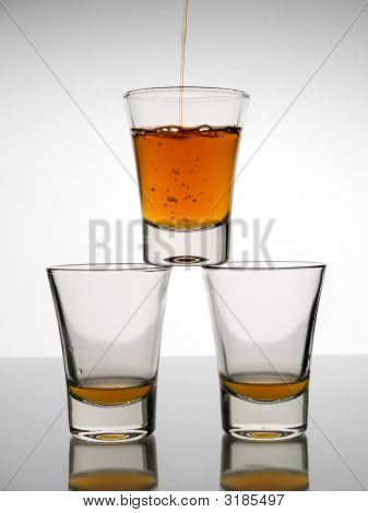 Três doses de Whisky